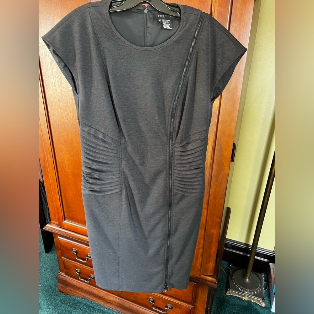 Grey dress size 12. No longer in corporate no need for these.